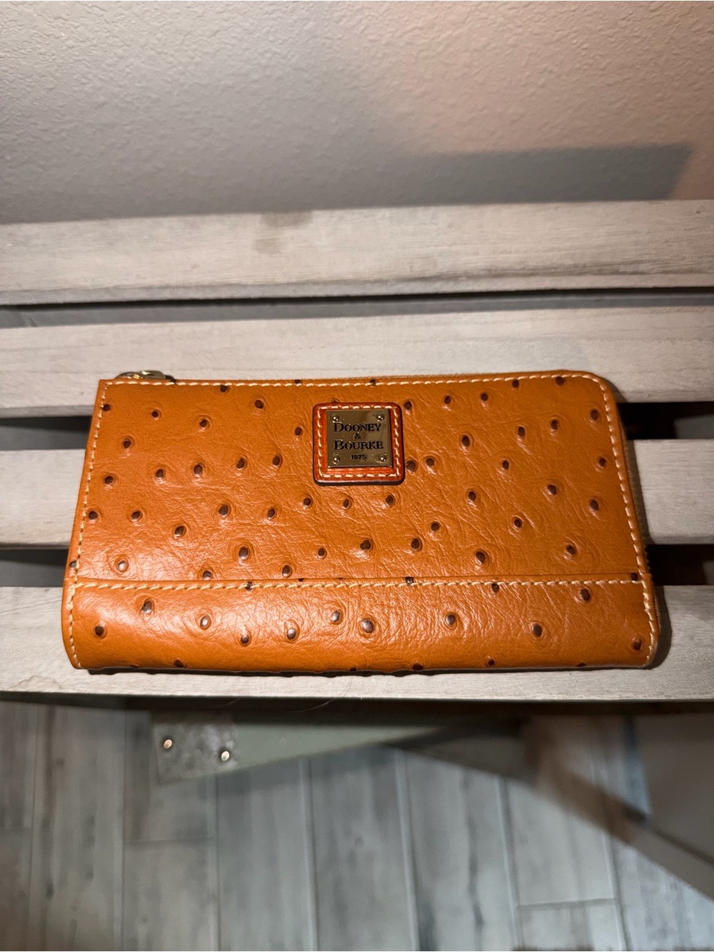 Dooney & Bourke Tan Ostrich-Embossed Zip Wallet with Gold Plaque